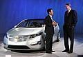 LG Chem President and CEO Kim Bahn-suk (left) meets with General Motors Chairman and CEO Rick Wagoner in front of the Chevrolet Volt electric vehicle at the North American International Auto Show in Detroit.